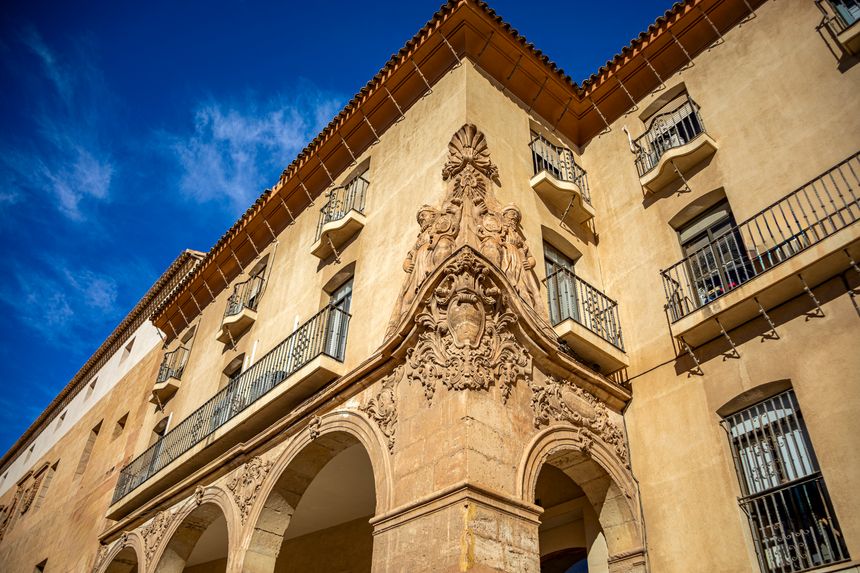 18th century building of the first instance courts of Lorca, Murcia, former Casa del Corregidor, with arches and large reliefs