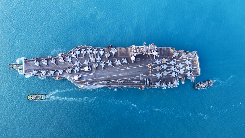 Nuclear war ship, Navy ship, Military navy. nuclear carrier running in the ocean. Military navy ship carrier full loading fighter jet aircraft for prepare troops